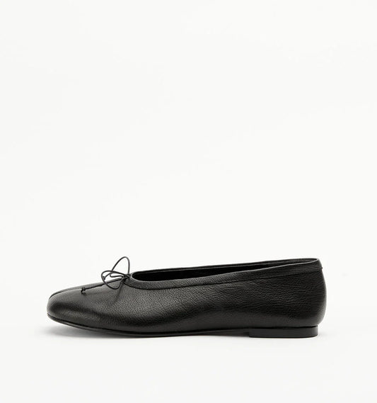Alias Mae Lana Tabi Ballet Flat in Black Tumble, side profile showing the low heel and leather finish.