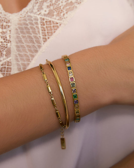 Arms of Eve Quinn Gold Cuff in Multi — quintessentially elevated, the Quinn Cuff is a sparkling statement designed to shine.
