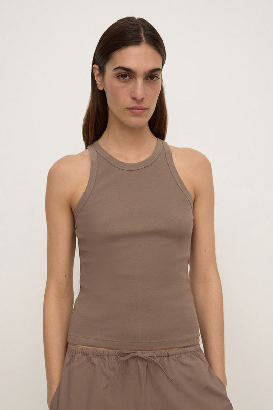 Assembly Label Tabitha Rib Tank in Dark Sand — a rib tank with just enough edge to stand on its own.