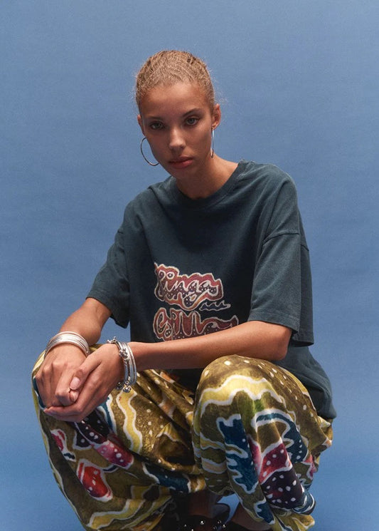 Kinga Csilla Avviso Lotus Og Tee — bring a playful graphic energy and a worn-in feel to your everyday rotation.