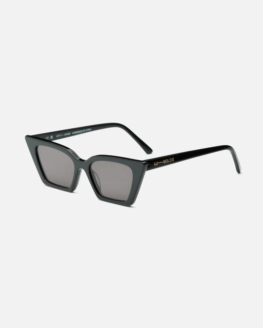 Lu Goldie Claudia in Black — sunnies sharp enough to cut down all competition.