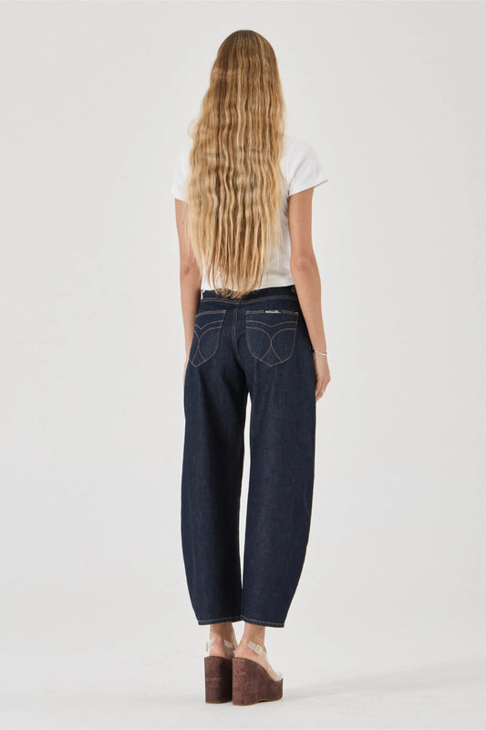 Rollas Gigi Barrel Super Rinse — the Gigi Barrel Super Rinse by Rolla’s is a modern denim silhouette designed with a relaxed barrel leg and a clean dark rinse wash.