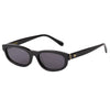Angled three-quarter view of the 180EYEWEAR 'Gia' sunglasses in gloss black, showing the gold '8O' hinge logo and glossy acetate rectangular frame.