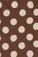 Brown fabric with beige polka dots