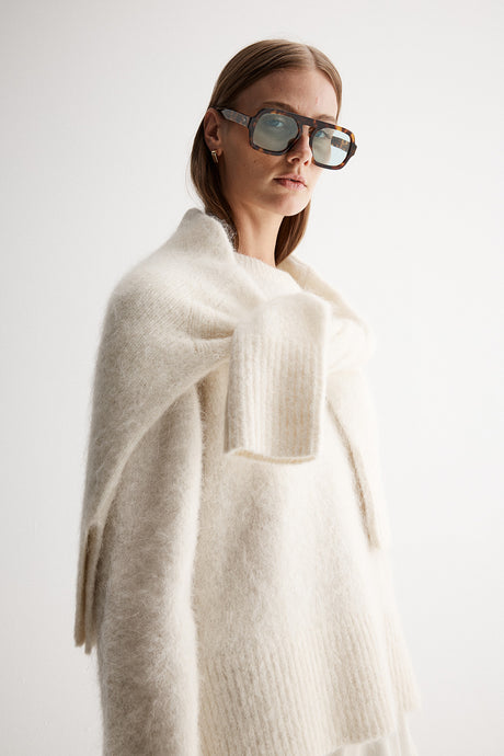 Tallulah sweater in Ivory in alpaca wool blend, relaxed fit, full sleeves, crew neckline, ribbed detailing—perfect for layering in winter. 