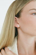 Porter Pear Studs 1CT in Gold, showing the pear-cut cubic zirconia stones in a gold vermeil setting