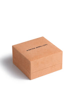 Porter Tube Bangle 6mm packaging shot showing the bangle in Porter's branded velvet box