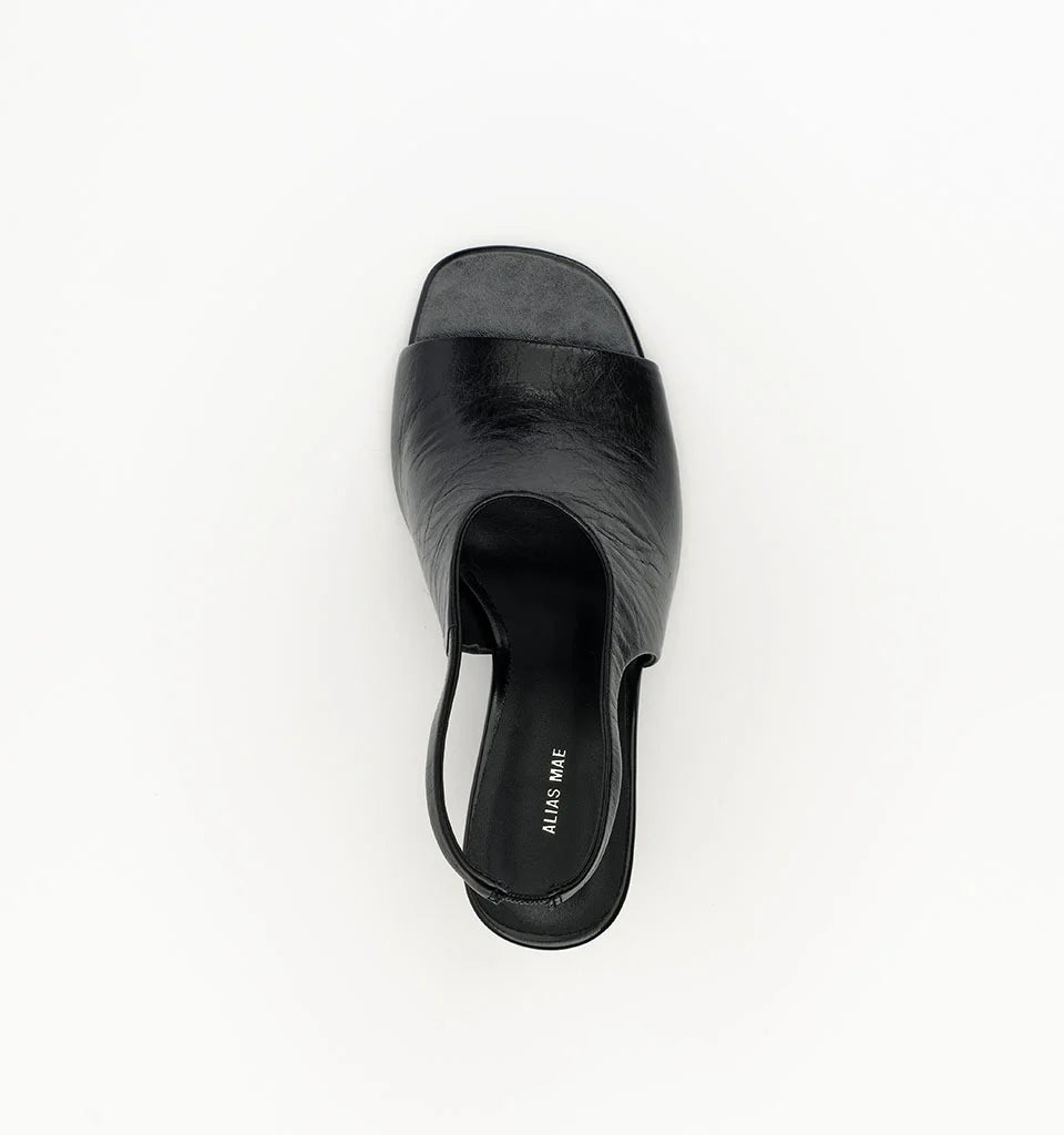 Alias Mae Jackie Slingback Heels in Black Oily Crinkle Leather — the Alias Mae Jackie Slingback Heels bring a sleek, sophisticated edge to your occasion wardrobe, featuring an open toe and elegant slingback silhouette.