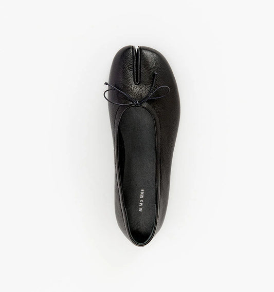 Alias Mae Lana Tabi Ballet Flat in Black Tumble, top view showing the split toe and bow detail.
