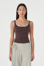 Close-up of the espresso tank, showing the square scoop neckline, wide shoulder straps, fine knit texture, cream contrast edging and fitted silhouette.