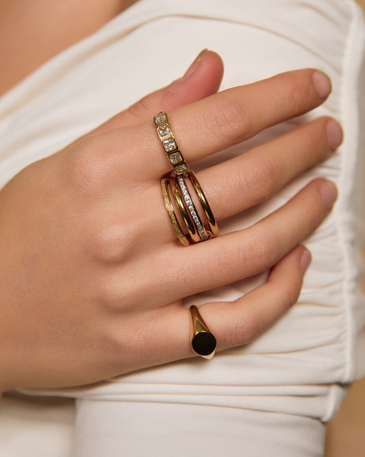 Arms of Eve Charlie Ring in Gold — the sparkling finishing touch your everyday ring stack has been waiting for.