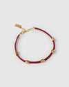 Arms of Eve Eye Bracelet in Burgundy — the protective, symbolic addition your daily jewelry stack has been waiting for.
