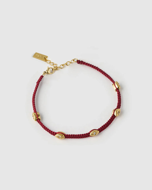 Arms of Eve Eye Bracelet in Burgundy — the protective, symbolic addition your daily jewelry stack has been waiting for.