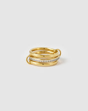 Arms Of Eve Indigo Gold Ring, front product view showing the layered gold bands and zircon stones.