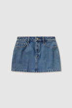 Dark stone denim mini skirt laid flat, showing the waistband, front pockets, zip fly and straight mini-length silhouette