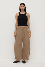 Assembly Label Lola Barrel Pant in Dark Tan, front view on model.
