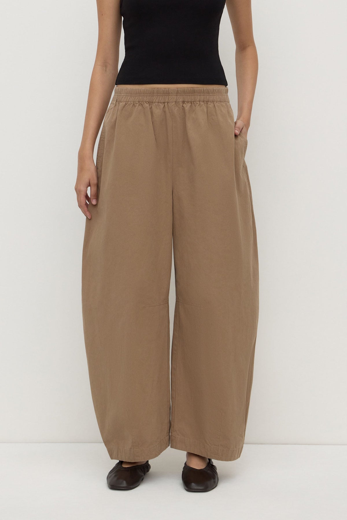 Assembly Label Lola Barrel Pant in Dark Tan, cropped front view showing the barrel-leg silhouette.
