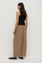 Assembly Label Lola Barrel Pant in Dark Tan, back view on model.
