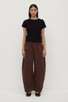 Assembly Label Lola Barrel Pant in Ganache, front view on model.
