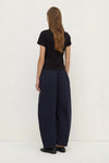 Assembly Label Lola Barrel Pants in Navy — the Lola Barrel Pants in Navy offer a relaxed take on everyday dressing with a voluminous barrel-leg silhouette.