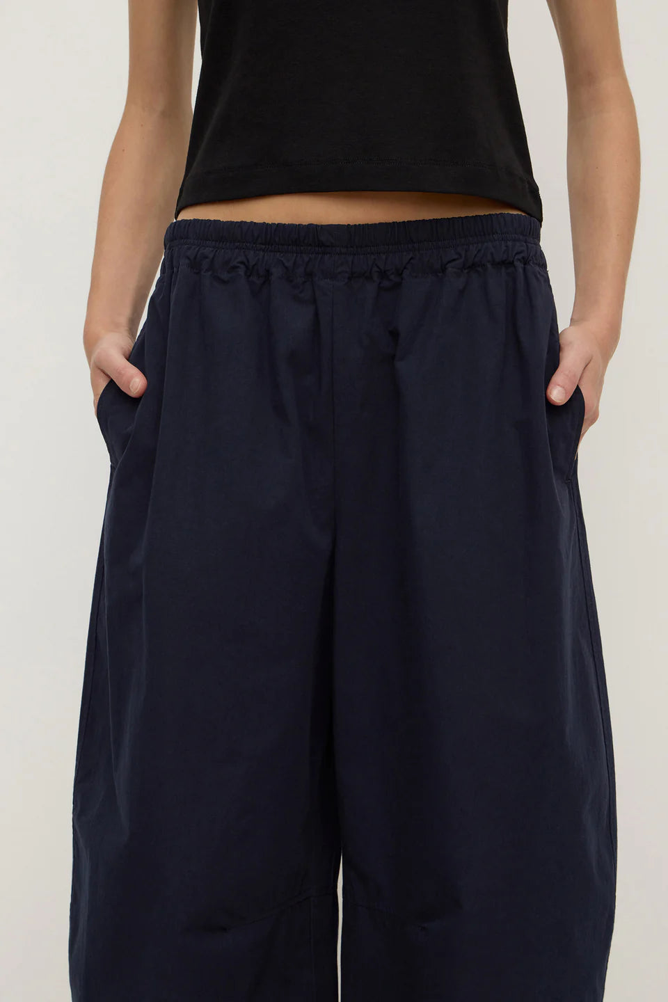 Assembly Label Lola Barrel Pants in Navy — the Lola Barrel Pants in Navy offer a relaxed take on everyday dressing with a voluminous barrel-leg silhouette.