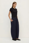 Assembly Label Lola Barrel Pants in Navy — the Lola Barrel Pants in Navy offer a relaxed take on everyday dressing with a voluminous barrel-leg silhouette.