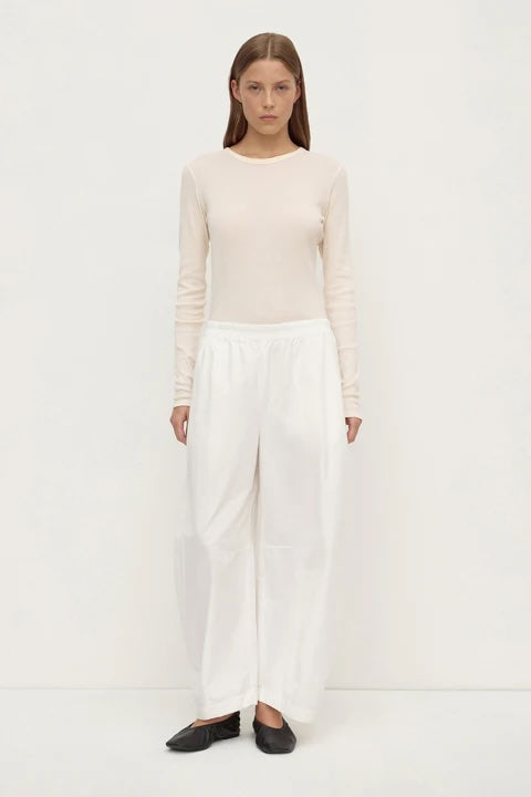 Assembly Label Lola Barrel Pants in White — a modern wardrobe staple with a softly sculpted silhouette, the Assembly Label Lola Barrel Pants in White feature a relaxed curved leg with subtle tapering through the hem.