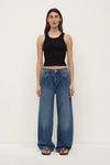 Assembly Label Low Curve Jeans in Mid Blue — the Assembly Label Low Curve Jeans in Mid Blue offer a relaxed take on everyday denim with a contemporary curved-leg silhouette.