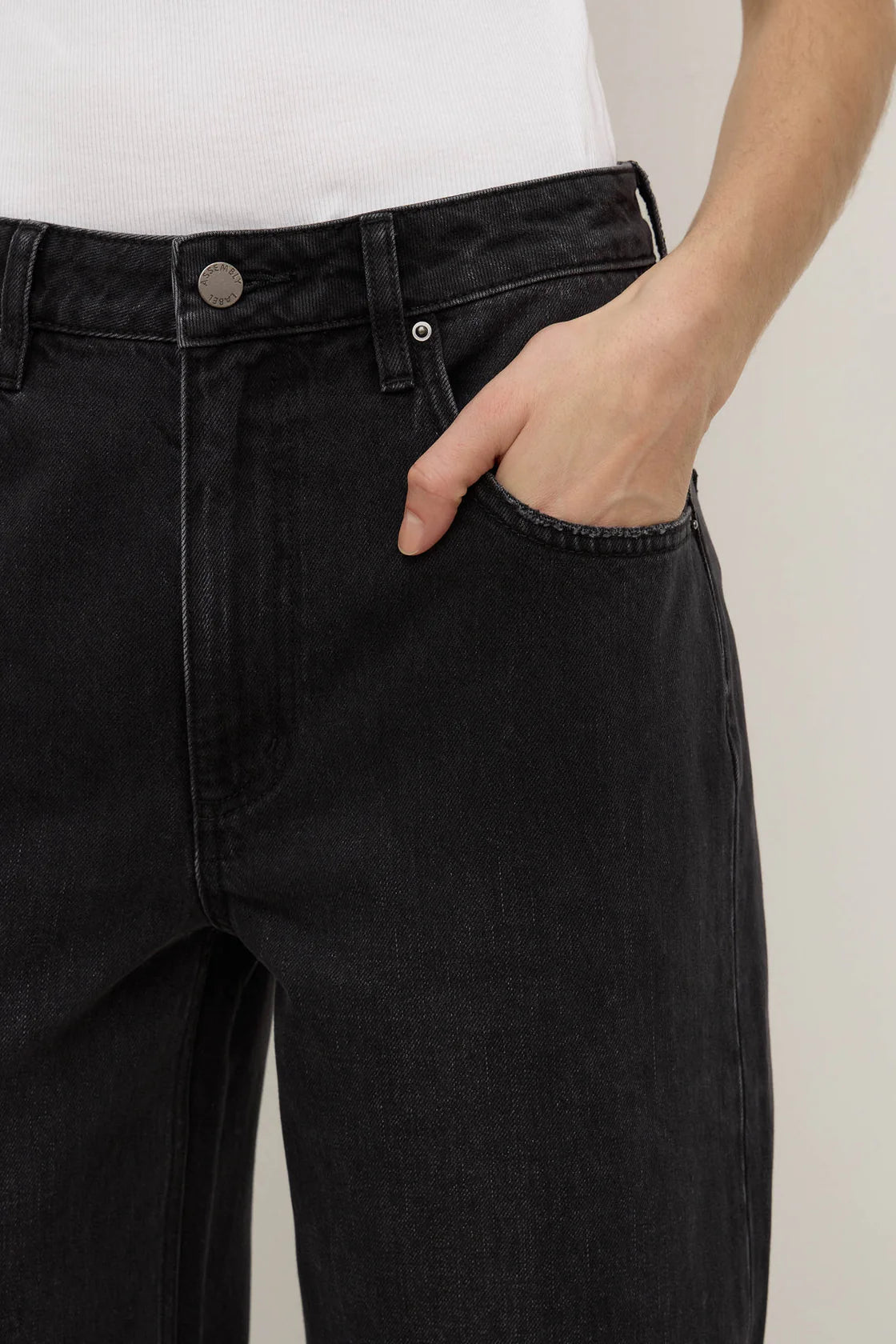 Assembly Label Low Curve Mid Rise in Faded Black — the elevated seasonal staple your capsule wardrobe has been waiting for.