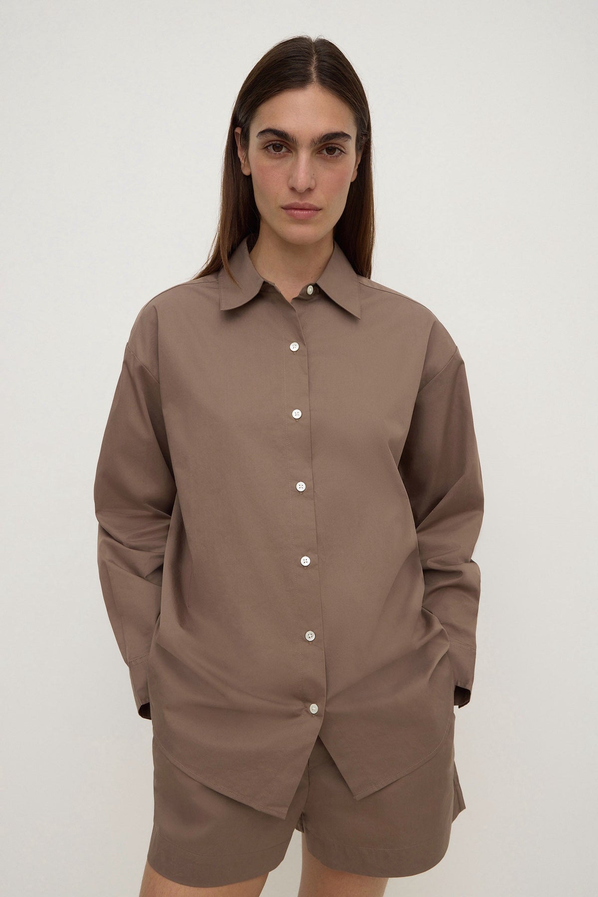 Assembly Label Micha Poplin Long Sleeve Shirt in Dark Sand — the crisp cotton shirt that quietly does the most work in your wardrobe.