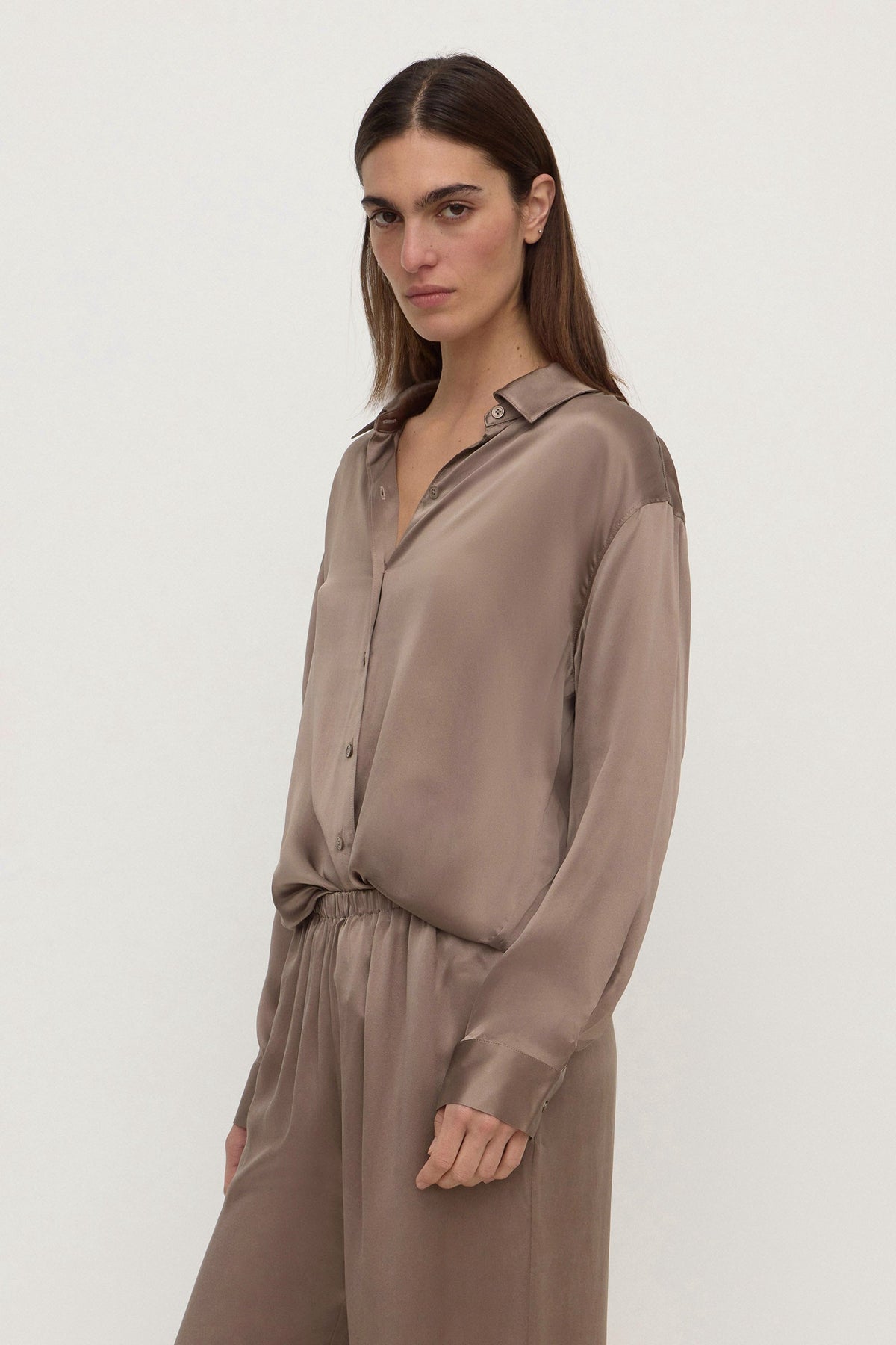 Assembly Label Pippa Silk Long Sleeve Shirt in Dark Sand — consider this your new quiet-luxury uniform piece.