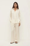 Assembly Label Pippa Silk Pant in Cream — an elevated everyday essential with a beautifully fluid silhouette, the Assembly Label Pippa Silk Pants in Cream bring understated luxury to relaxed and occasion styling.