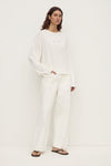 Assembly Label Slow Burn Wide Sleeve Tee in Antique White, angled front view showing the oversized fit and wide sleeves.
