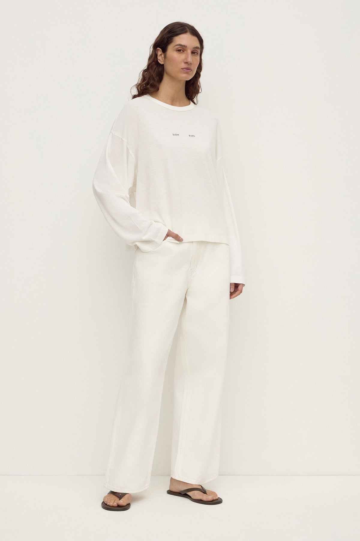 Assembly Label Slow Burn Wide Sleeve Tee in Antique White, angled front view showing the oversized fit and wide sleeves.
