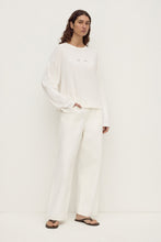 Assembly Label Slow Burn Wide Sleeve Tee in Antique White, angled front view showing the oversized fit and wide sleeves.
