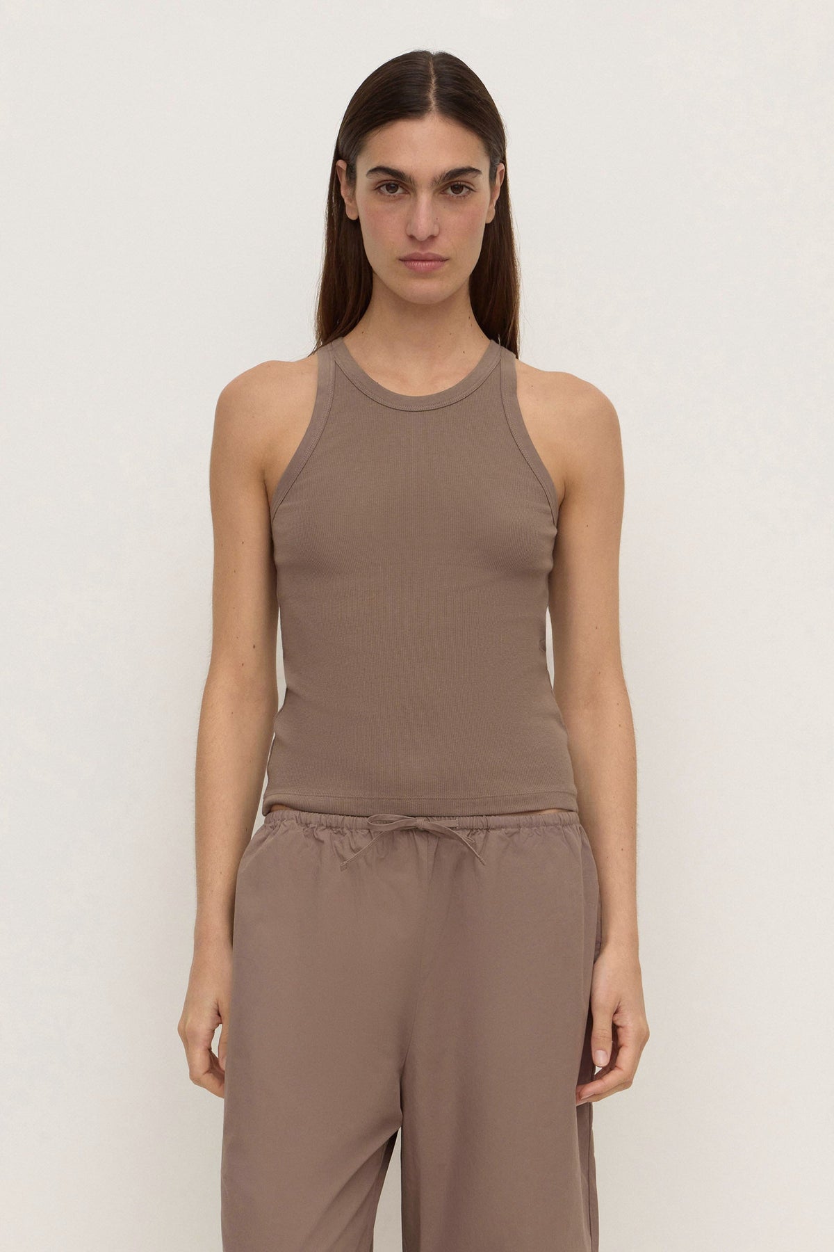 Assembly Label Tabitha Rib Tank in Dark Sand — a rib tank with just enough edge to stand on its own.