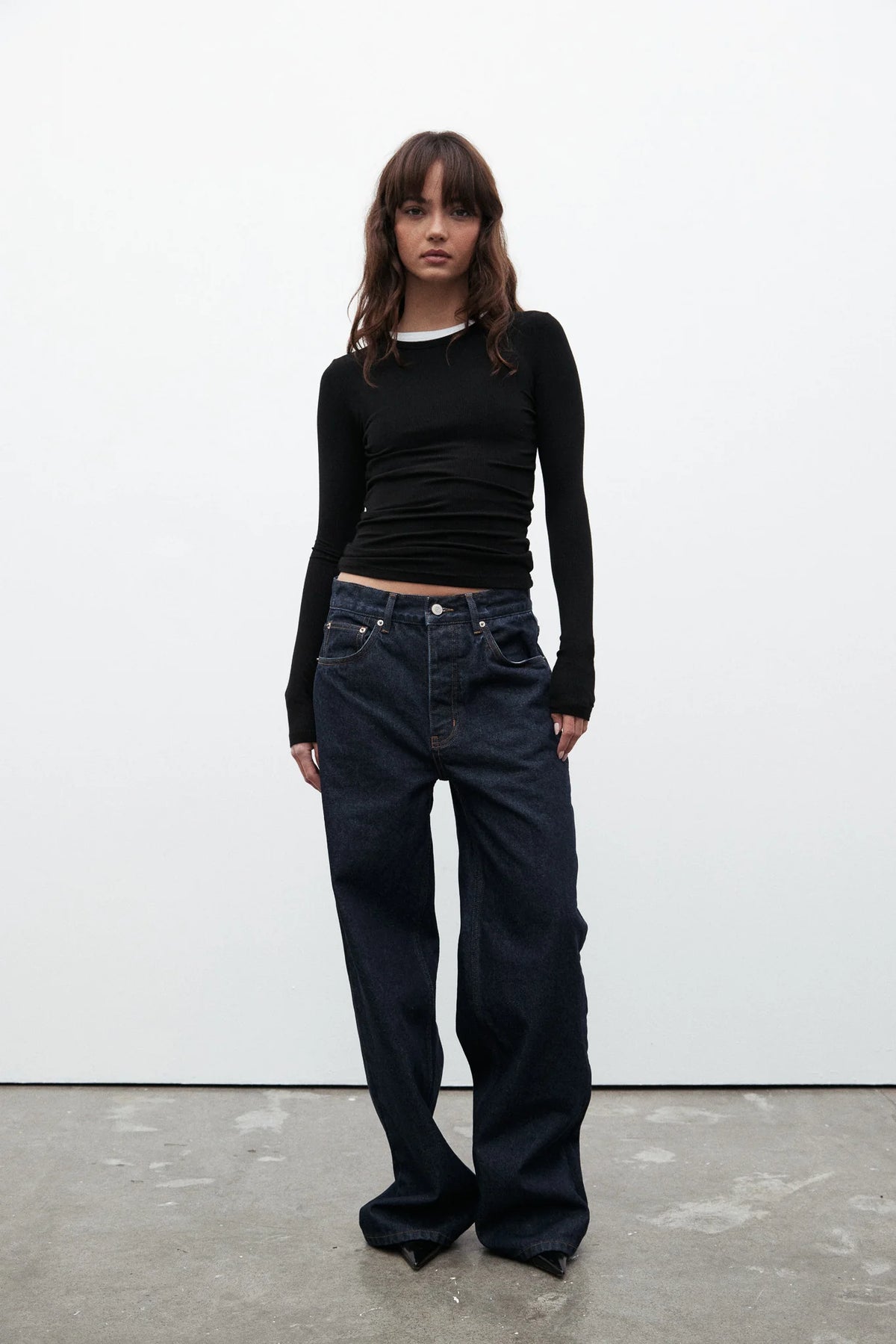 Bayse Brand Nyla Top in Black — the Bayse Brand Nyla Top is an elevated everyday essential, featuring a flattering crew neckline and soft ribbed finish.