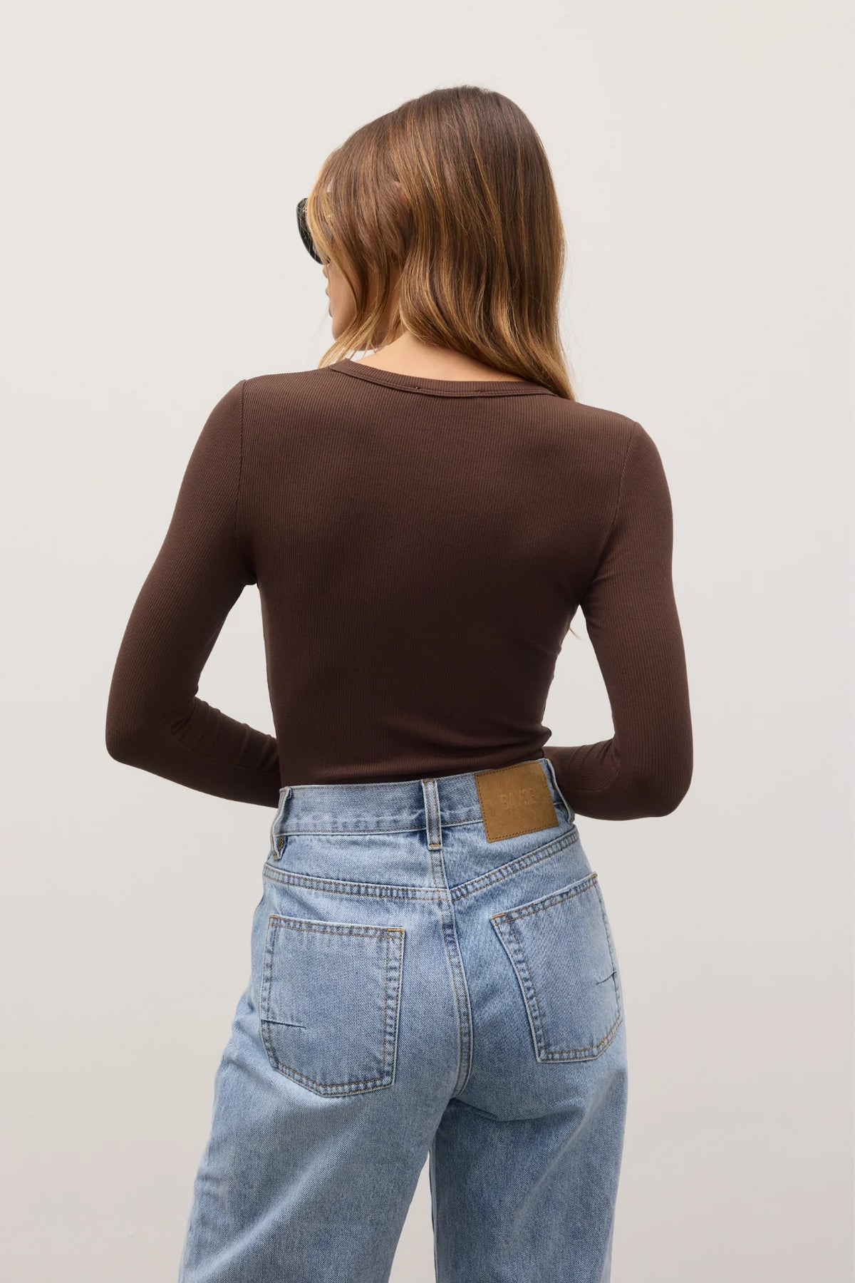 Bayse Brand Nyla Top in Espresso, back view showing the fitted silhouette.
