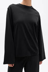 Bayse Brand Priya Long Sleeve Top in Black — a versatile everyday layer with a relaxed, modern silhouette, the Bayse Brand Priya Long Sleeve Top in Black features dropped shoulders and elongated sleeves for an effortlessly refined look.