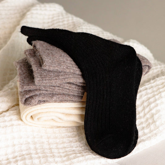 Bed & Butter The Comfiest Socks in Black — Sold-Out Collection Made from a blend of responsibly sourced cashmere wool and recycled fibres, these socks will keep your feet cosy and comfy.