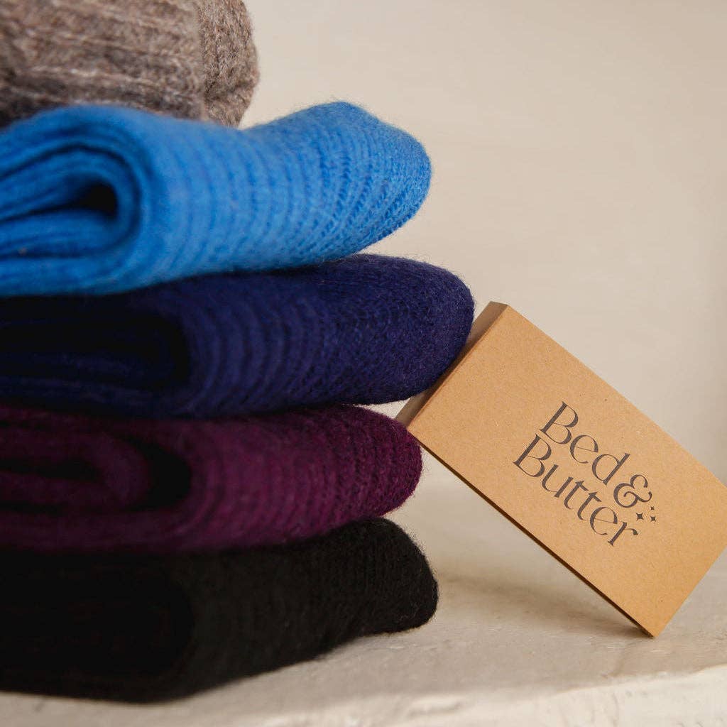 Bed & Butter The Comfiest Socks in Black — Sold-Out Collection Made from a blend of responsibly sourced cashmere wool and recycled fibres, these socks will keep your feet cosy and comfy.