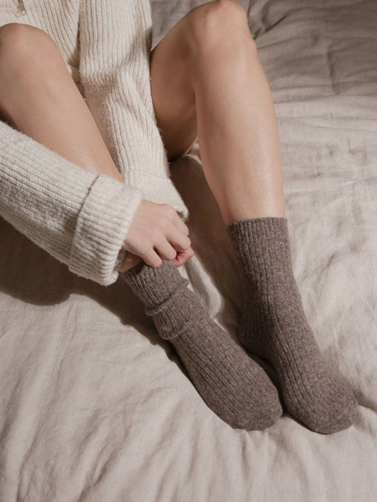 Bed & Butter The Comfiest Socks in Light Choccy — Sold-Out Collection 7x Made from a blend of responsibly sourced cashmere wool and recycled fibres, these socks will keep your feet cosy and comfy.