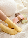Bed & Butter The Comfiest Socks in Yellow — 7x Sold-Out Collection Made from a blend of responsibly sourced cashmere wool and recycled fibres, these socks will keep your feet cosy and comfy.