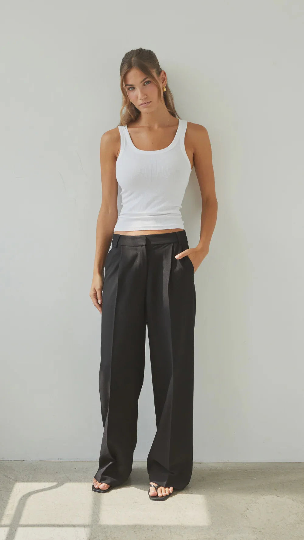 Charli London Nelly Trouser in Black — the Charli London Nelly Trouser in Black offers a masterclass in effortless, urban luxury.