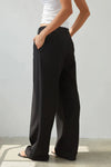 Charli London Nelly Trouser in Black — the Charli London Nelly Trouser in Black offers a masterclass in effortless, urban luxury.