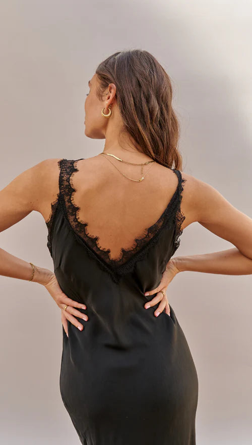 Charli London Solange Slip Dress in Black — the Charli London Solange Slip Dress in Black is the ultimate wardrobe icon, balancing effortless ease with high-end refinement.