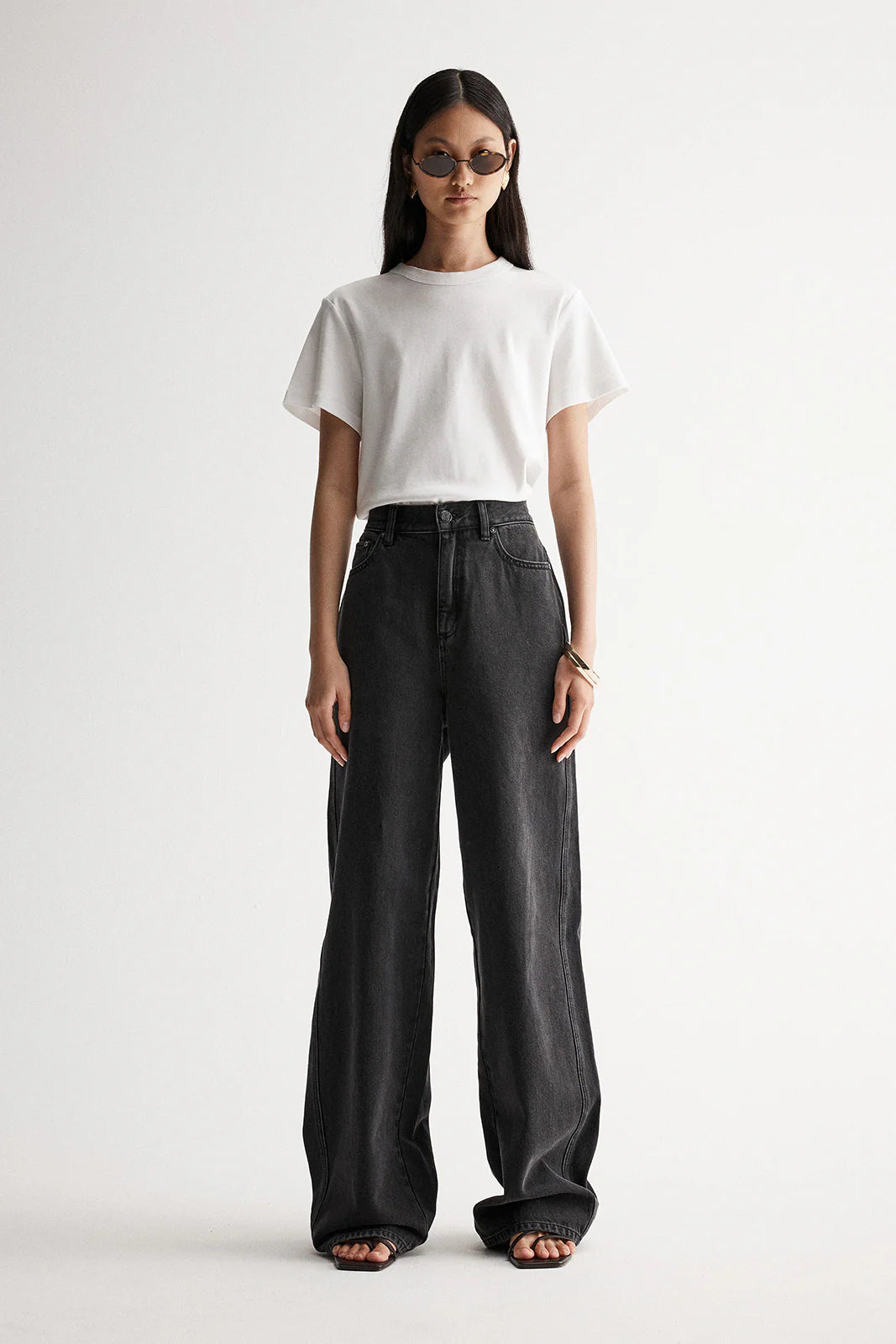 Elka Collective Apollo Wide Leg Jean in Washed Black — the Elka Collective Apollo Wide Leg Jean in Washed Black features a mid-rise fit with a full-length wide leg, creating an effortless, relaxed silhouette.