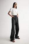 Elka Collective Apollo Wide Leg Jean in Washed Black — the Elka Collective Apollo Wide Leg Jean in Washed Black features a mid-rise fit with a full-length wide leg, creating an effortless, relaxed silhouette.
