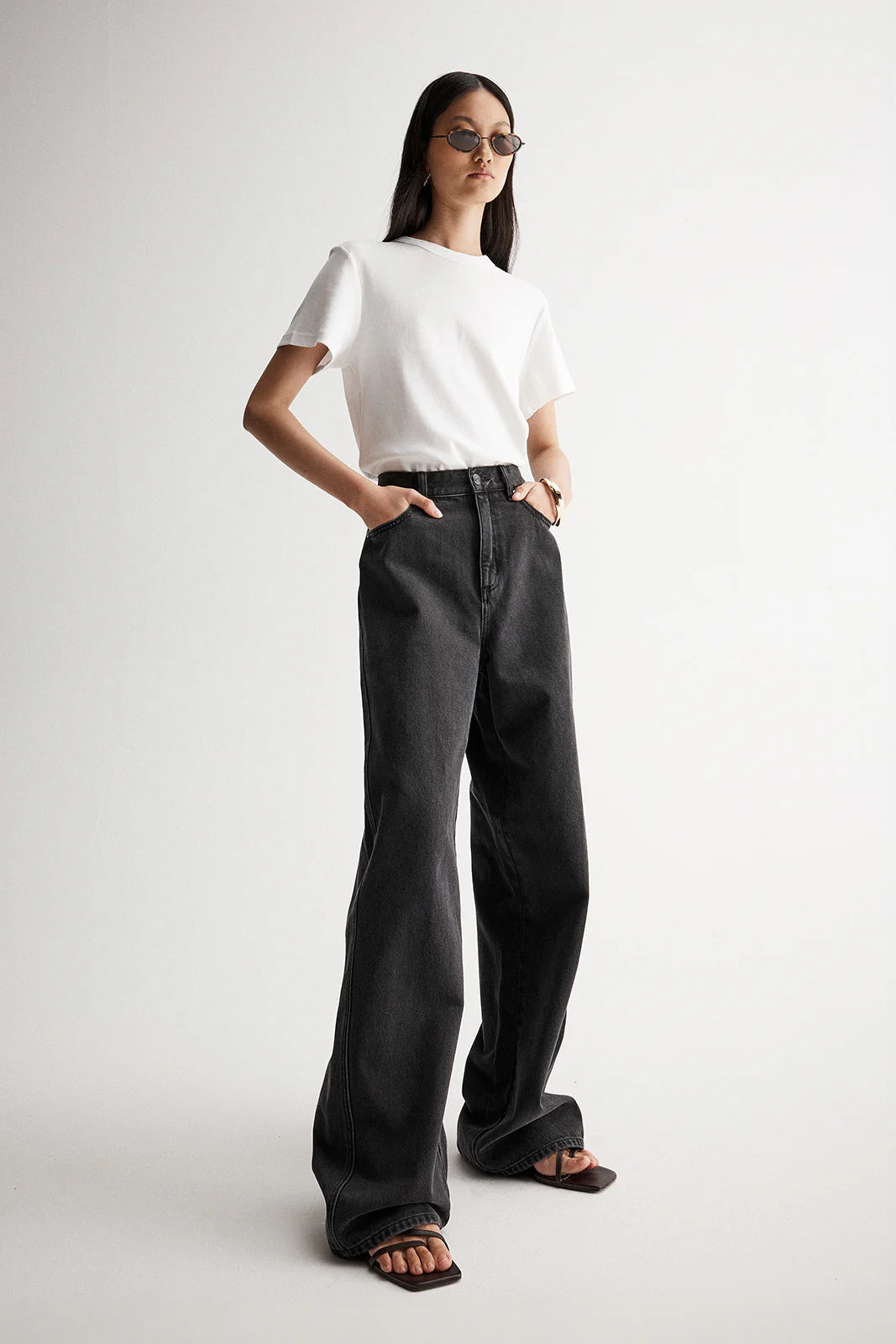 Elka Collective Apollo Wide Leg Jean in Washed Black — the Elka Collective Apollo Wide Leg Jean in Washed Black features a mid-rise fit with a full-length wide leg, creating an effortless, relaxed silhouette.