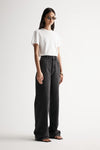 Elka Collective Apollo Wide Leg Jean in Washed Black — the Elka Collective Apollo Wide Leg Jean in Washed Black features a mid-rise fit with a full-length wide leg, creating an effortless, relaxed silhouette.